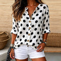 Laura | Polka dot print V-neck button down top 1