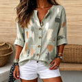 Katrina | Abstract paint print split V-neck button top 1